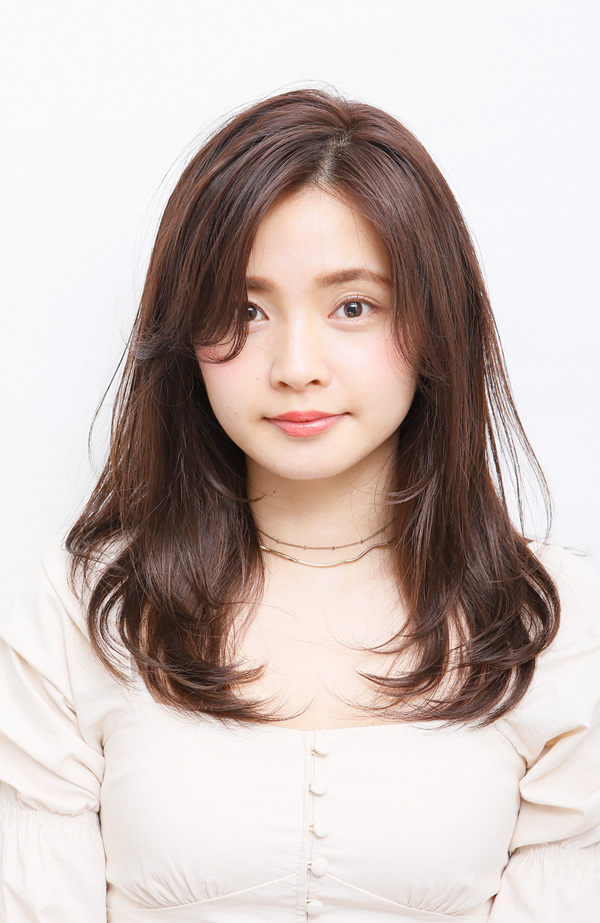 内に収まるよう乾かし毛先を巻いてふんわりと