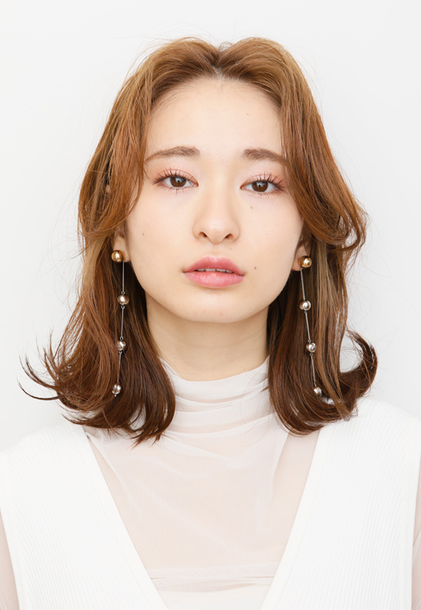 ヘアクリームでカールをキープしながらツヤ感を